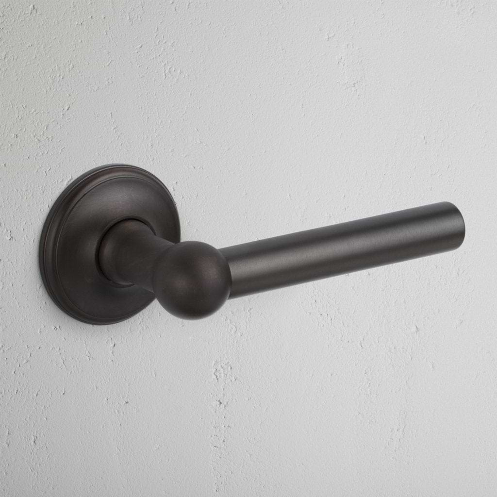 Bronze Harper Fixed Door Handle On White Background