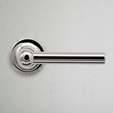 Polished Nickel Harper Sprung Door Handle On White Background