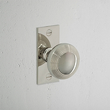 Poplar Short Plate Sprung Door Knob - Polished Nickel