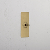 1G Architrave Centre Retractive Toggle Switch - Antique Brass