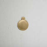 Antique Brass Canning Covered Key Escutcheon On White Background