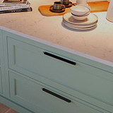 Bronze Oxford Furniture Handle 224mm Fitted onto a duck egg blue furniture draw with white marble top zoomed in front view. 