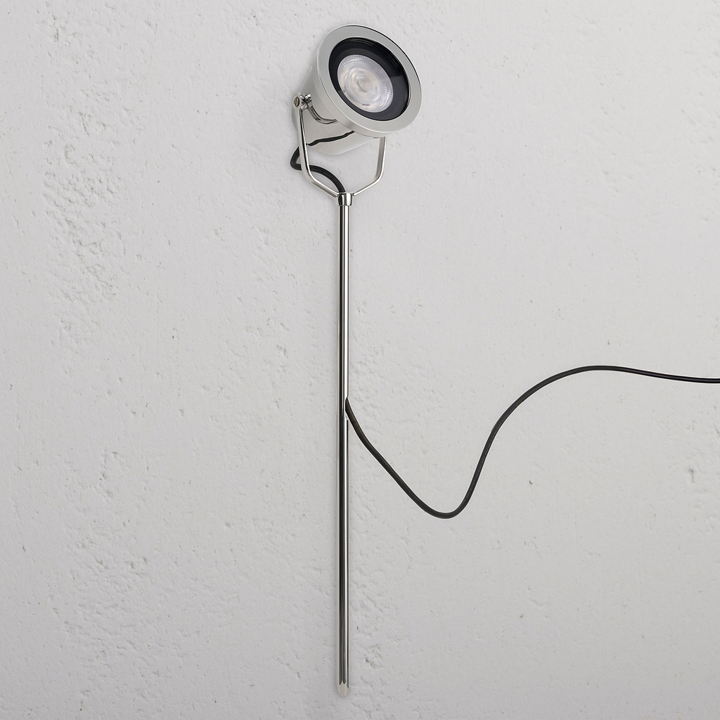 Cambridge Ground Floodlight in polished nickel, outdoor design with sleek stand and visible black power cord.