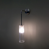 Polished Nickel Modern Wall Light Turned On With Fluted Glass