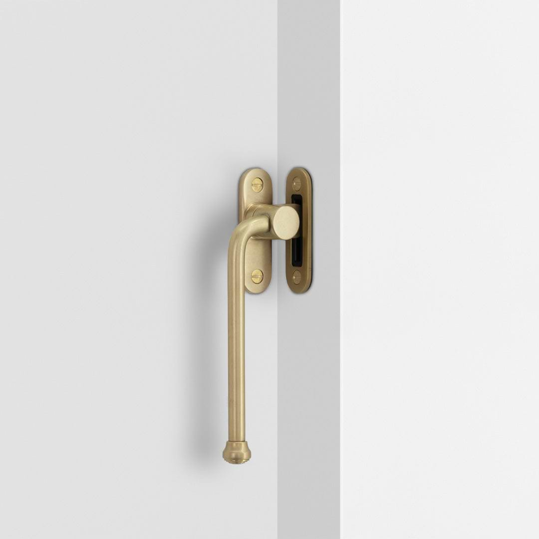 Southbank Casement Window Handle With Plate Left – Antique Brass