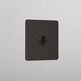 1G Centre Retractive Toggle Switch - Bronze