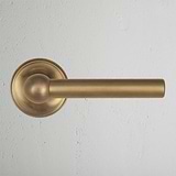Antique Brass Harper Unsprung Door Handle on White Background