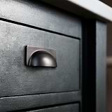 Bronze Elm Cup Handle on Black Furniture