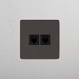 Efficiënte enkele RJ45-module in Brons Zwart met dubbele aansluitingen op witte achtergrond