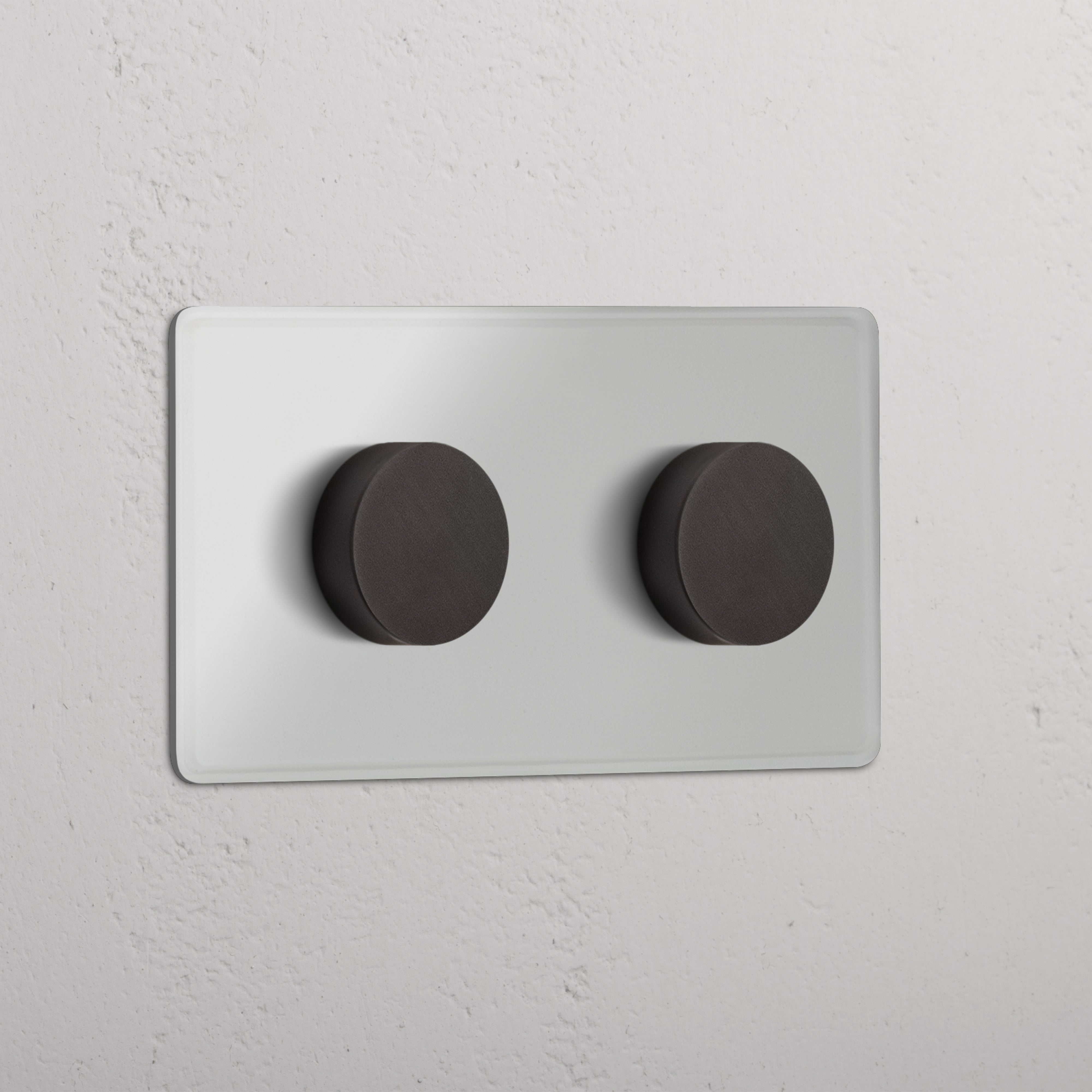 Dubbele afdekplaat schakelaars & dimmers: 2x Multicontrol Dimschakelaar in doorzichtig brons met twee knoppen.
