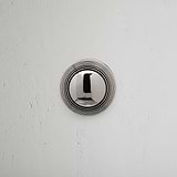 Polished Nickel Poplar Fixed Door Knob on White Background