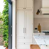 Bronze Barlow Furniture Knobs on White Cupboard in a Bathroom