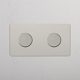Dubbele afdekplaat schakelaars & dimmers in gepolijst nikkel met twee ronde bedieningsknoppen, 2x multicontrol.