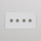 Zweifachrahmen mit 4x Kipphebelschalter – Lackierbar mit polierten Nickel-Kippschaltern.