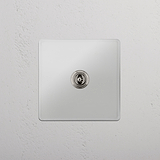 Schalter mit Aus-Position in der Mitte – Kipphebelschalter – Durchsichtig + Poliertes Nickel – vielseitige Lichtlösung – auf weißem Hintergrund