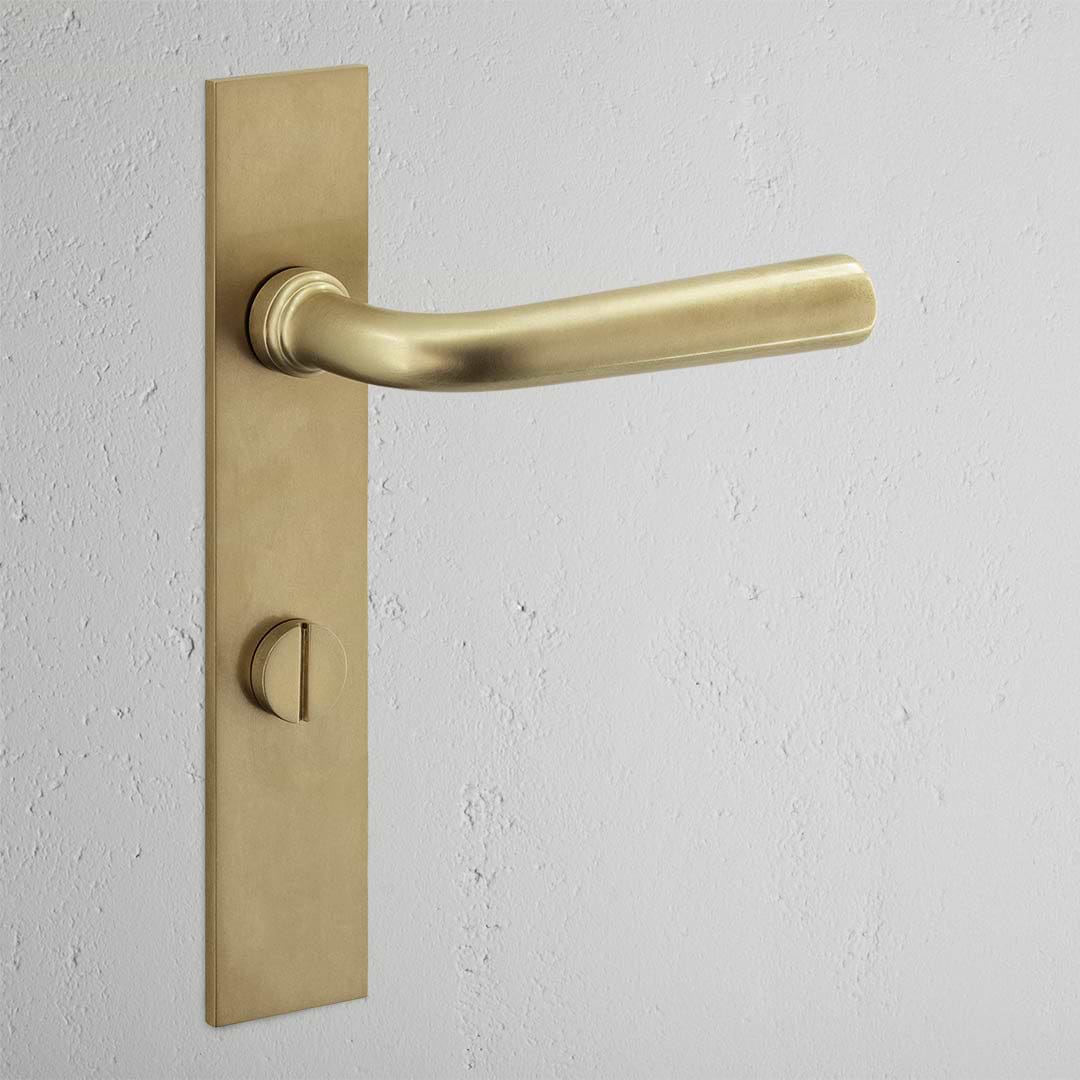 Apsley Langschildgarnitur mit gefedertem Türgriff und Drehknopf – Antikes Messing