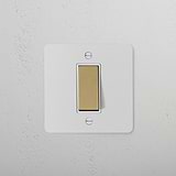 1G Double Pole Rocker Switch in Paintable Antique Brass with White finish, ideal for style-conscious decor integration.