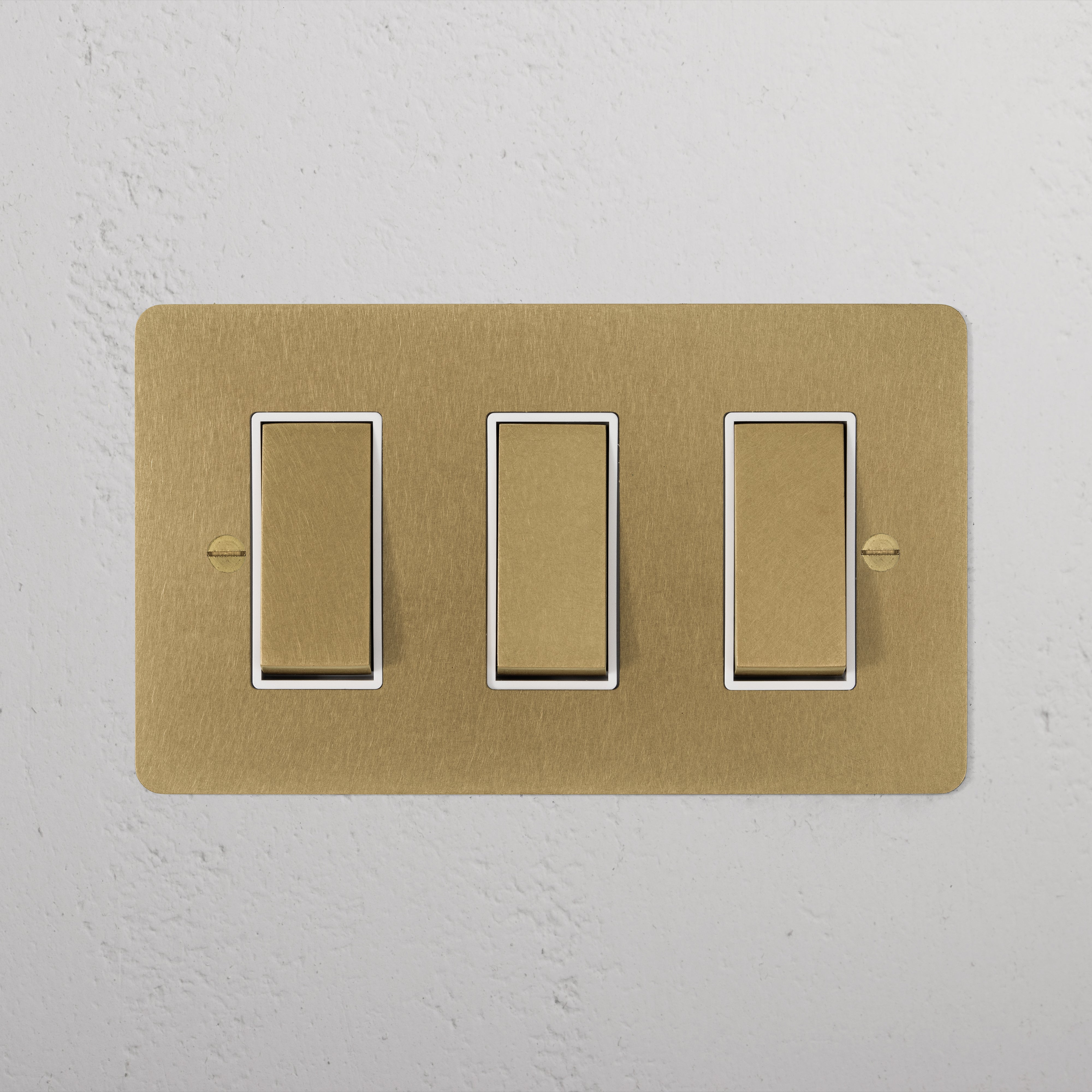 3G Two Way Rocker Switch in Antique Brass White on a white textured wall, part of the 3G Switches & Dimmers collection.