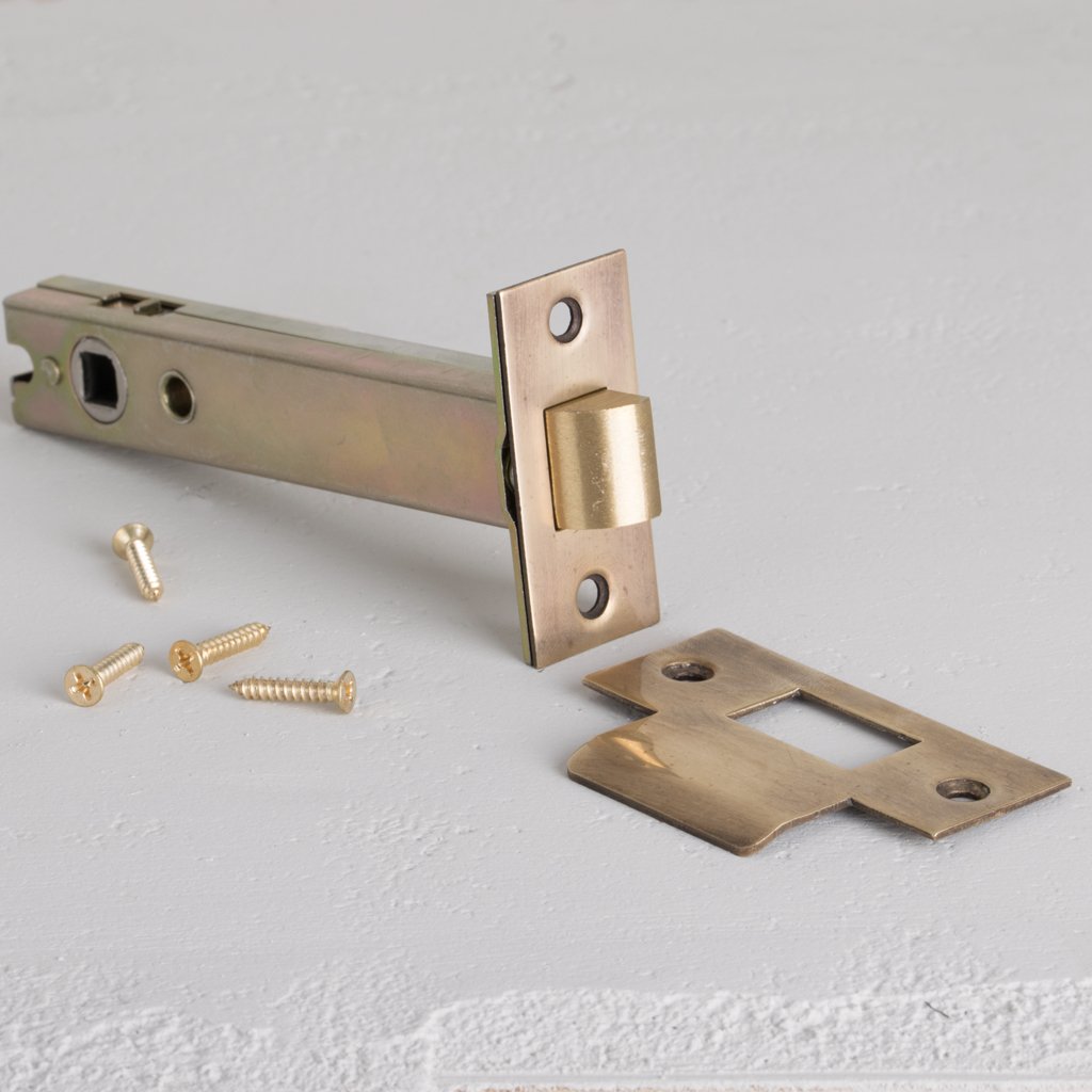 Antique Brass Light Latch 100mm On White Background