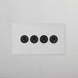 4G Two Way Toggle Switch in Paintable Bronze on a wall plate, ideal for flexible lighting control and custom styling.