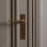 Clayton Long Plate Sprung Door Handle - Antique Brass  