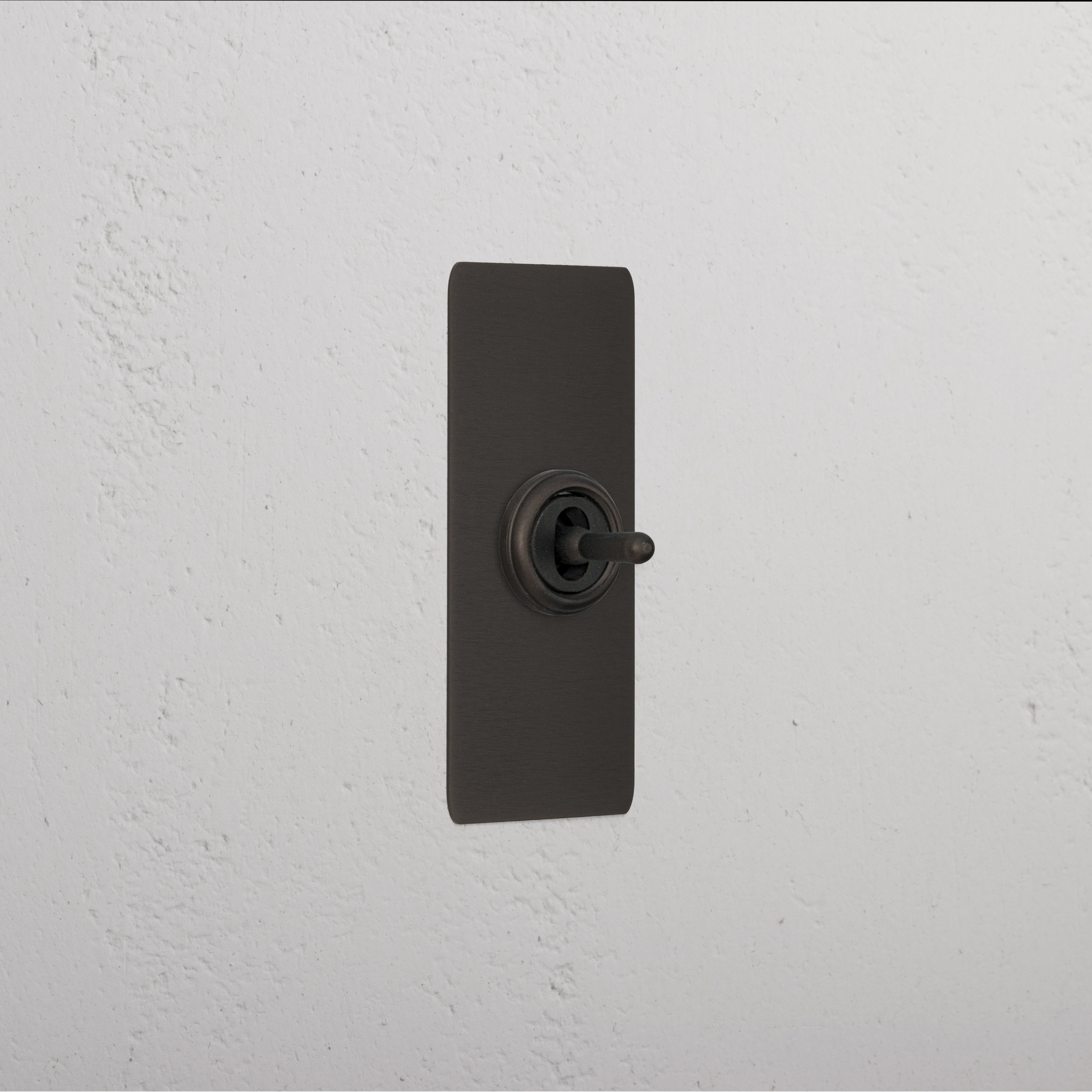 1G Architrave Centre Retractive Toggle Switch - Bronze