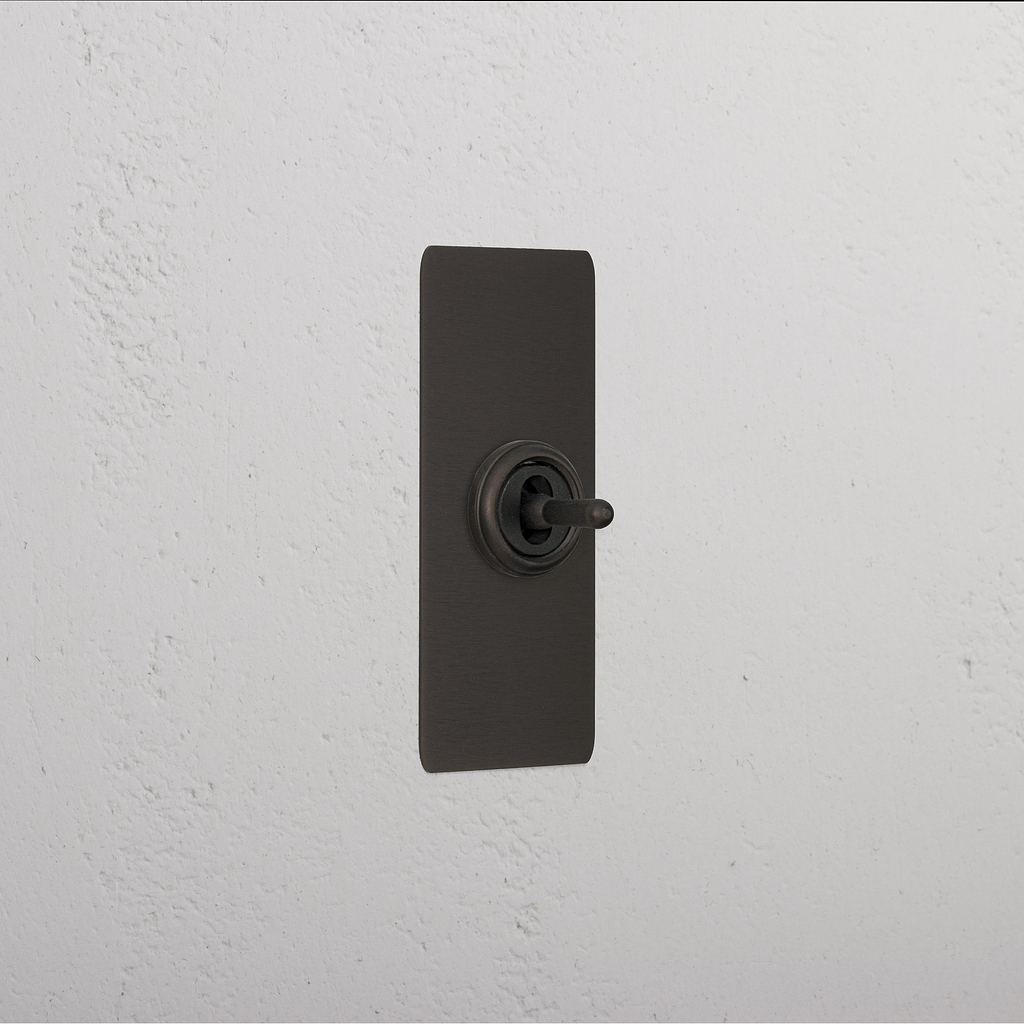 1G Architrave Centre Retractive Toggle Switch - Bronze