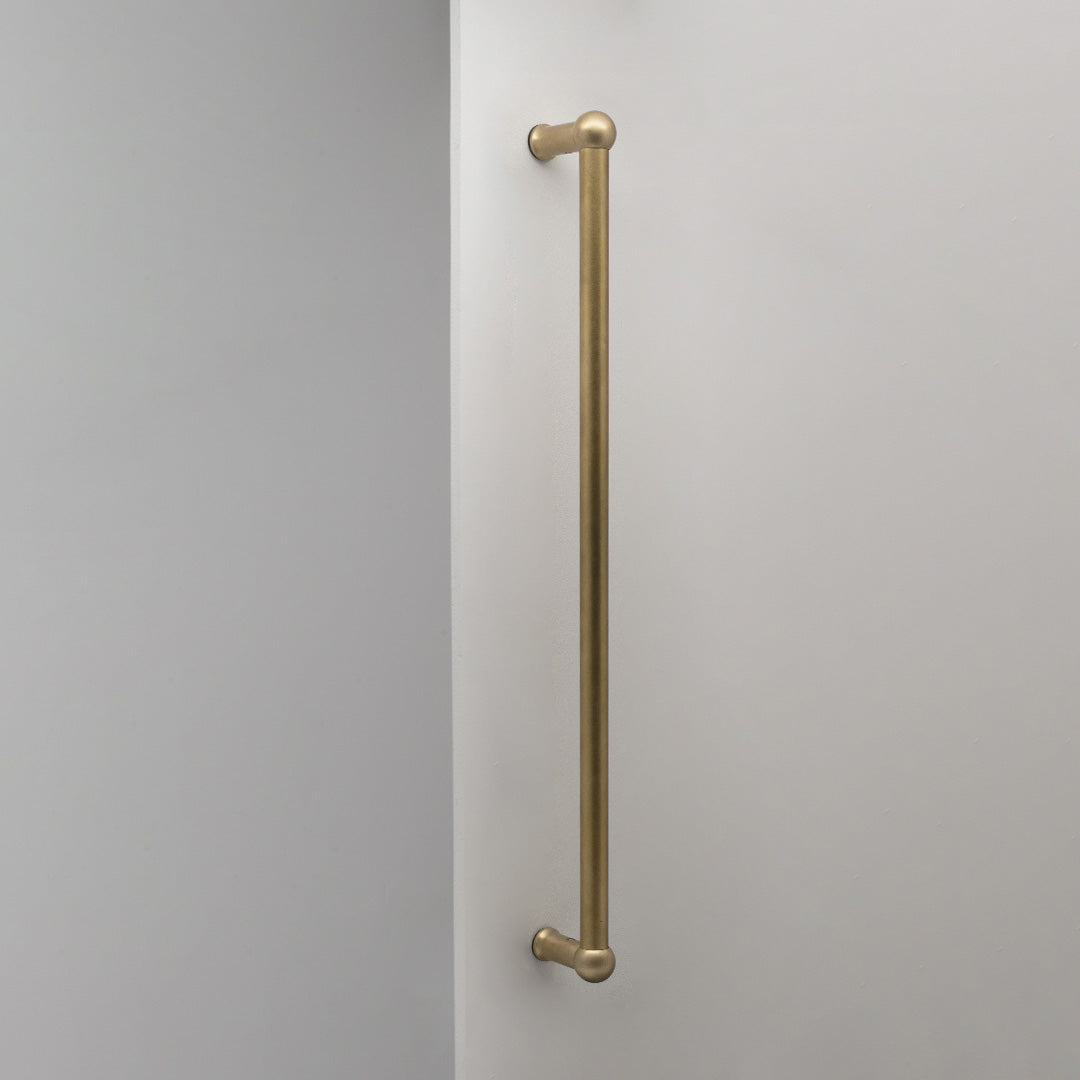 Antique Brass Harper Single Pull Handle 500mm On White Background