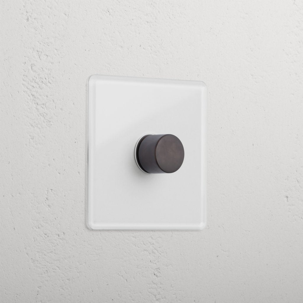 1G Digital Dimmer Switch in Clear Bronze with a black knob, designed for sleek modern interiors.