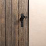 Bronze Onslow Long Plate Sprung Door Knob & Thumbturn on a wooden door with vertical planks.