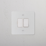 Switched Fused Spur (FCU) - Paintable White Isolator Switch on a textured white wall.