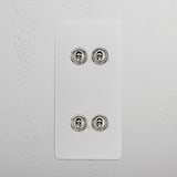 4G Vertical Two Way Toggle Switch in Paintable Polished Nickel, featuring four toggle switches on a sleek plate.