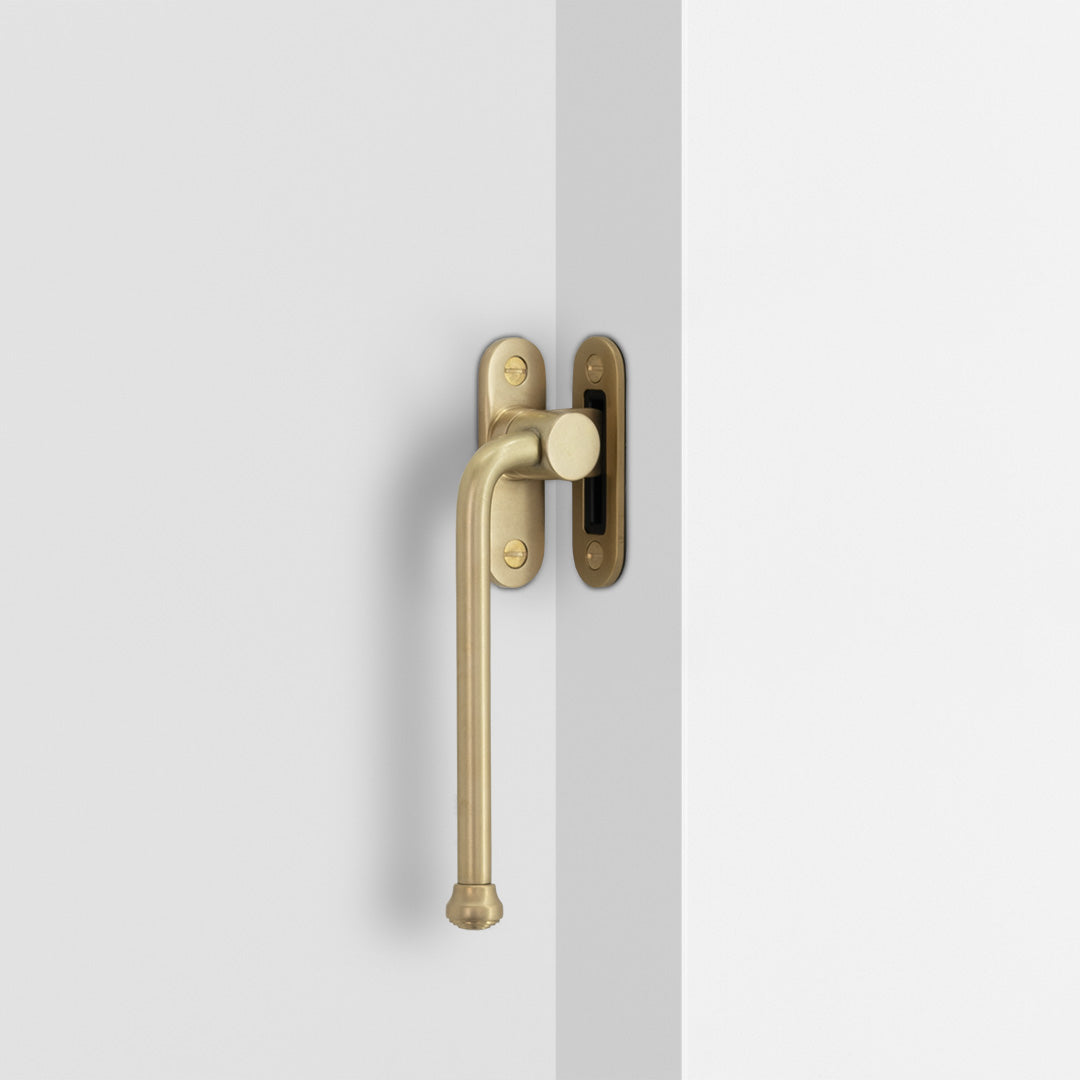 Southbank Casement Window Handle With Plate Left – Antique Brass