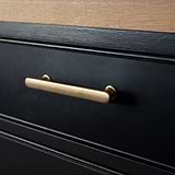 Antique Brass Milliner Handle On Black Furniture