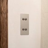 4G Vertical Two Way Toggle Switch in polished nickel on a white wall; part of 4G Switches & Dimmers collection.
