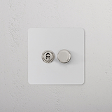 2G Mixed Switch 1T1D with a paintable polished nickel finish on a white textured wall.