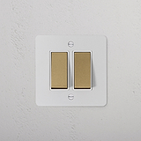 2G Two Way Rocker Switch in paintable antique brass on white, suitable for 2G switches and dimmers.