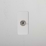 1G Architrave Two Way Toggle Switch in paintable polished nickel on wall, part of 1G Switches & Dimmers collection.