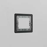 Bronze 1G 50mm brass module plate designed for switch or outlet, showcased on a textured white wall.