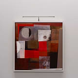 Framed abstract painting with red, brown, white shapes on a white wall under a 580mm nickel picture light.