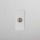 1G Architrave Centre Retractive Toggle Switch in Paintable Polished Nickel, suitable for 1G switches & dimmers.