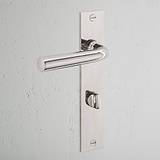 Polished Nickel Apsley Long Plate Door Handle & Thumbturn on white door with secure locking feature.