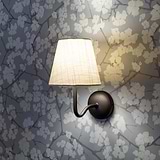 Malvern Medium Wall Light Alabaster White with bronze accents on a floral-patterned wallpaper background.