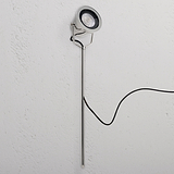 Cambridge Ground Floodlight in polished nickel, outdoor design with sleek stand and visible black power cord.