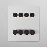 8G Mixed Switch 4T4D in paintable bronze with four black switches and four black dimmer buttons for 8G Switches & Dimmers.