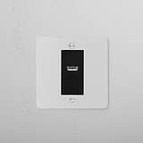 USB A+C Socket - Paintable Black, 1G wall-mounted socket, featuring a paintable finish for seamless decor integration.