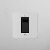 BT Slave Socket - Paintable Black, 1G Sockets & Modules on a white textured wall.