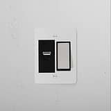 1G Two Way Rocker + USB A+C Slimline Switch in paintable polished nickel black finish on a white background.