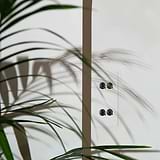 4G Vertical Two Way Toggle Switch in paintable bronze finish designed for seamless integration with interiors.