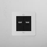 Paintable black 1G socket with 2x USB A+C ports for versatile wall charging.